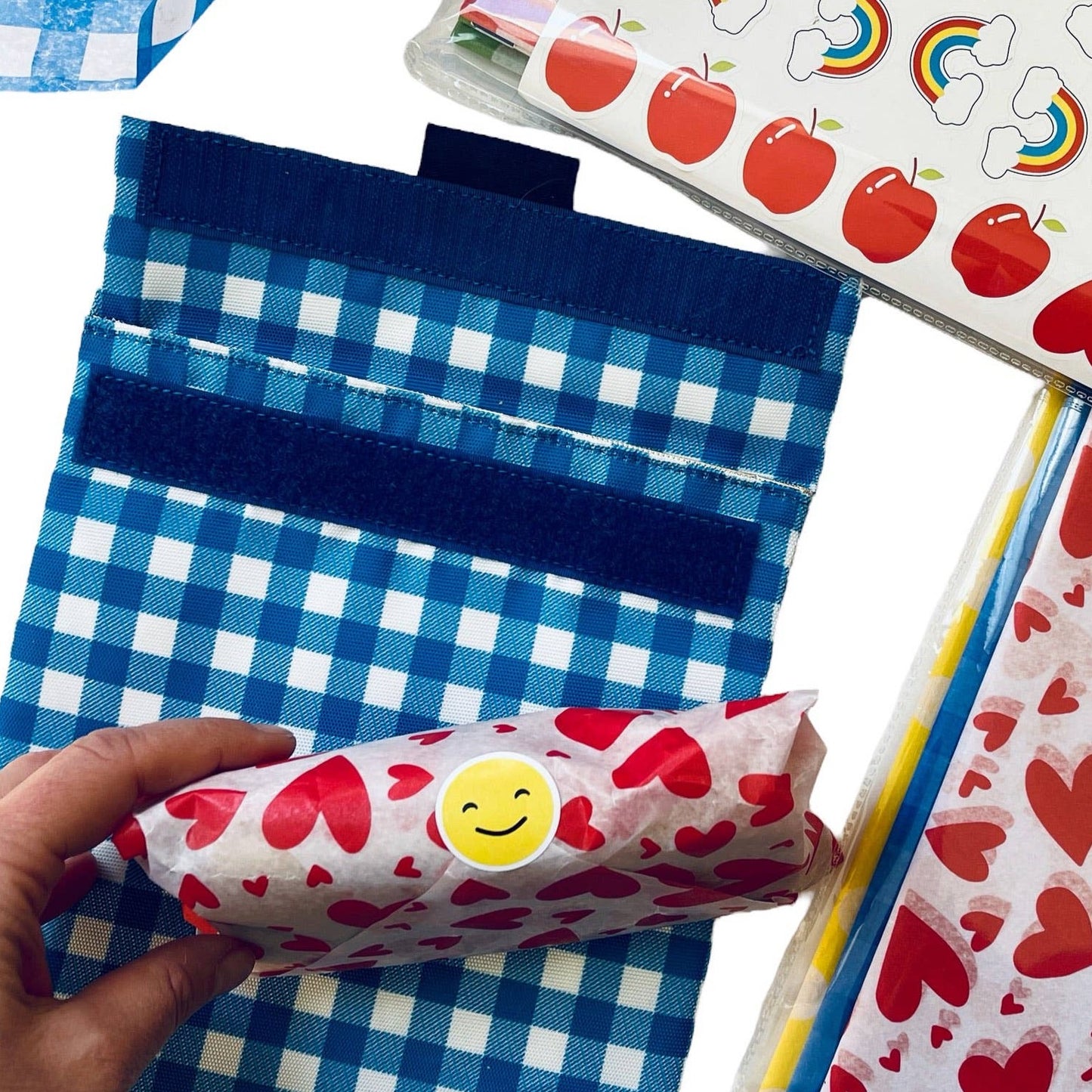 Sandwich wrapped in valentines day paper wrap. with reusable sandwich bag