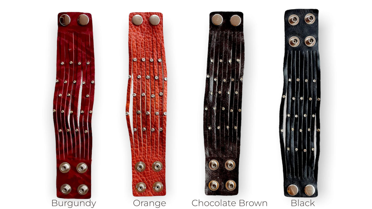 2" ribbed leather bracelet with studs in burgundy, orange, dark brown, black