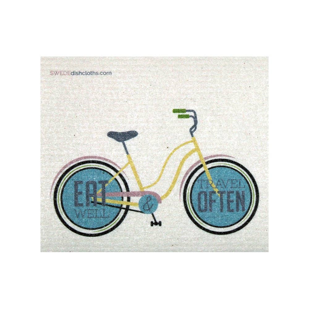 Yellow Bike with Blue Wheels.  Eat well, travel often slogan on Swedish dish cloth